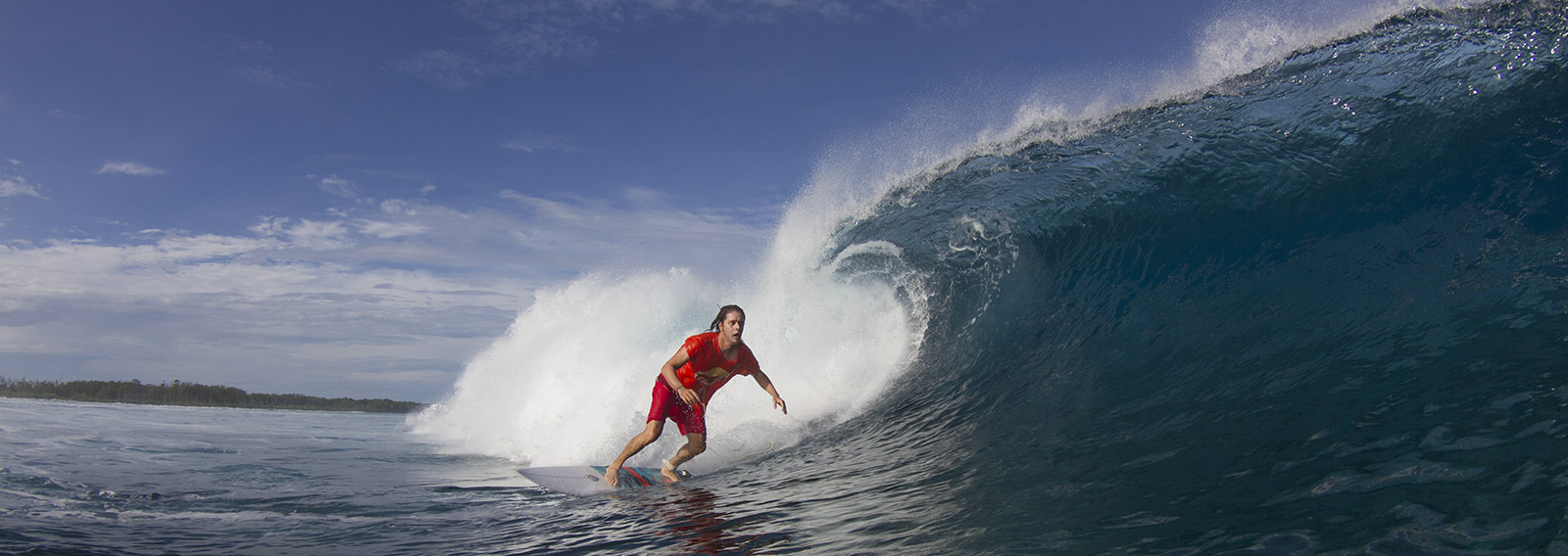 Surfer in a barrel in the Mentawai Islands